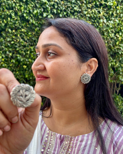 Pair of silver floral earrings on a black background, 92.5 Silver Earrings, Silver chitai earrings