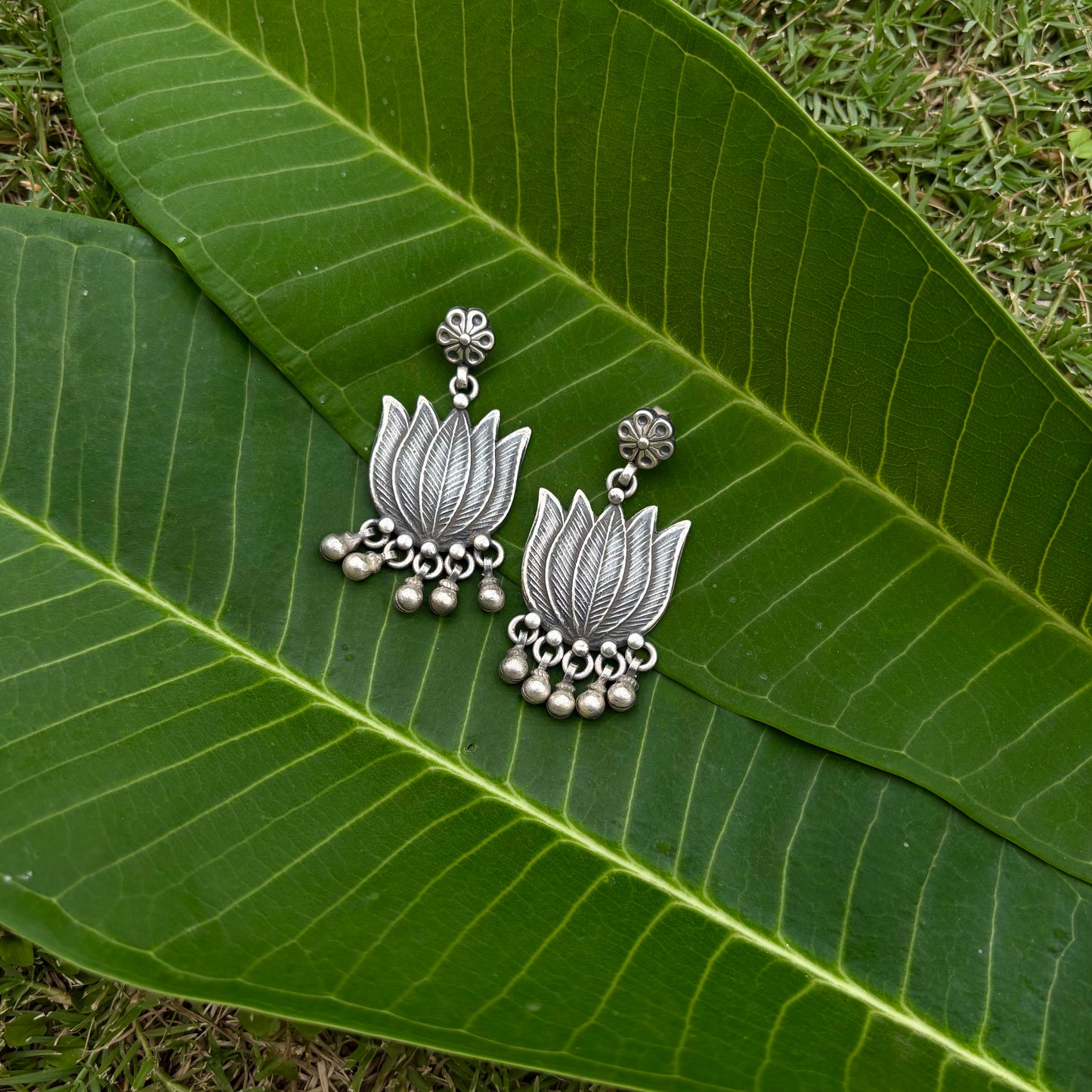 Shravani Tribal Lotus Silver Danglers